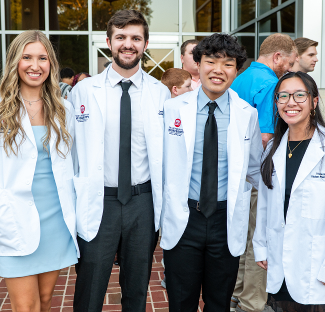 Group of EE students at the white coat ceremony