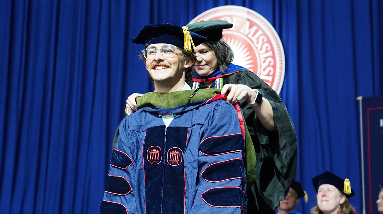 PharmD student being hooded.