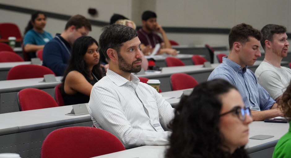Mark Stapleton of Xenon Pharmaceuticals, Inc. listening to a morning lecture.