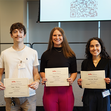 students holding awards