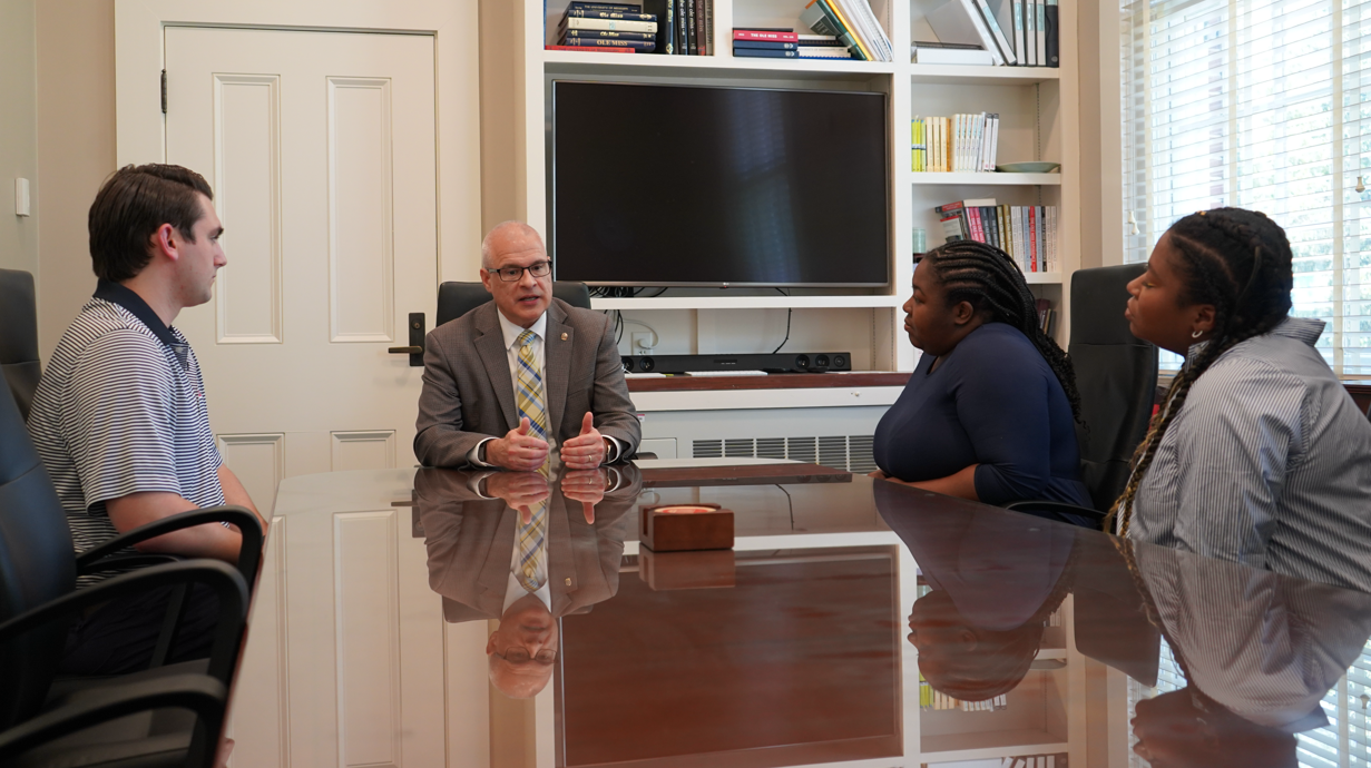 Provost Wilkin meeting with the trainees.