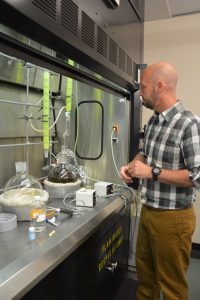 Research scientist Charles Cantrell works to find natural products that can be used as insect repellents at the University of Mississippi School of Pharmacy.