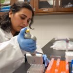Associate research and development biologist Nisha Mishra works in one of the UM School of Pharmacy’s Centers of Biomedical Research Excellence labs.