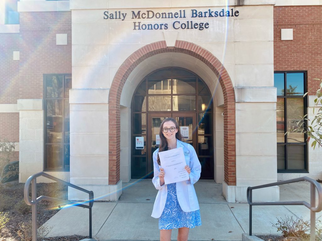 Leah Franks standing in front of the Sally McDonnell Barksdale Honors College
