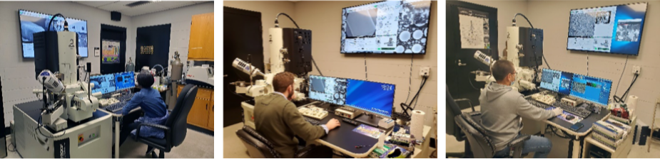 Graduate students operating the scanning electron microscope at the UM Microscopy and Imaging Center